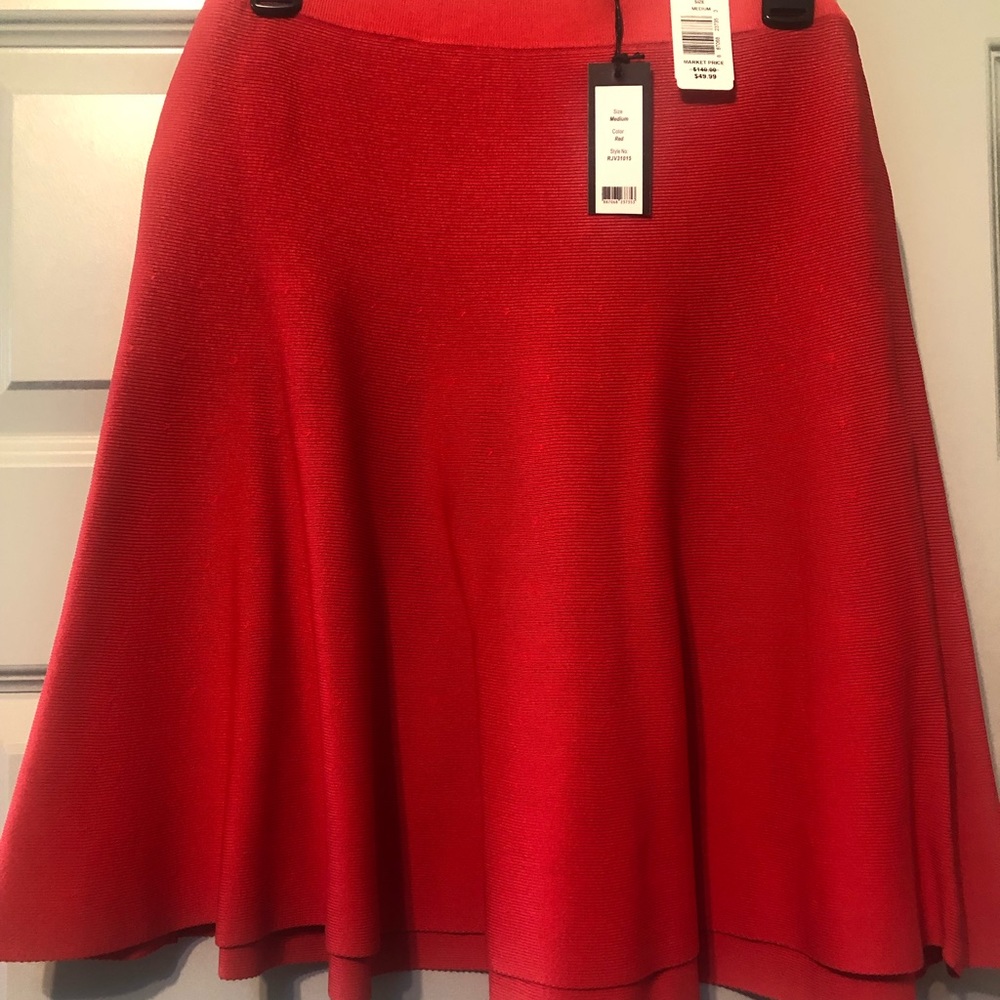 Super cute fitted band aid skirt with flare.